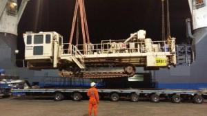 Large Construction Vehicle being loaded on Truck for oversize road freight in Perth